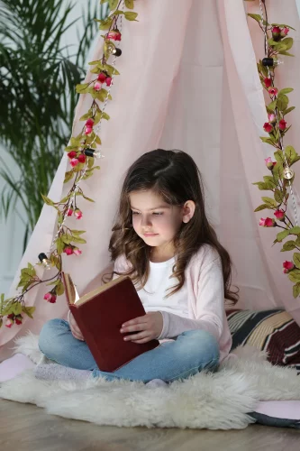 cute-girl-reading-book-around-cute-decoration